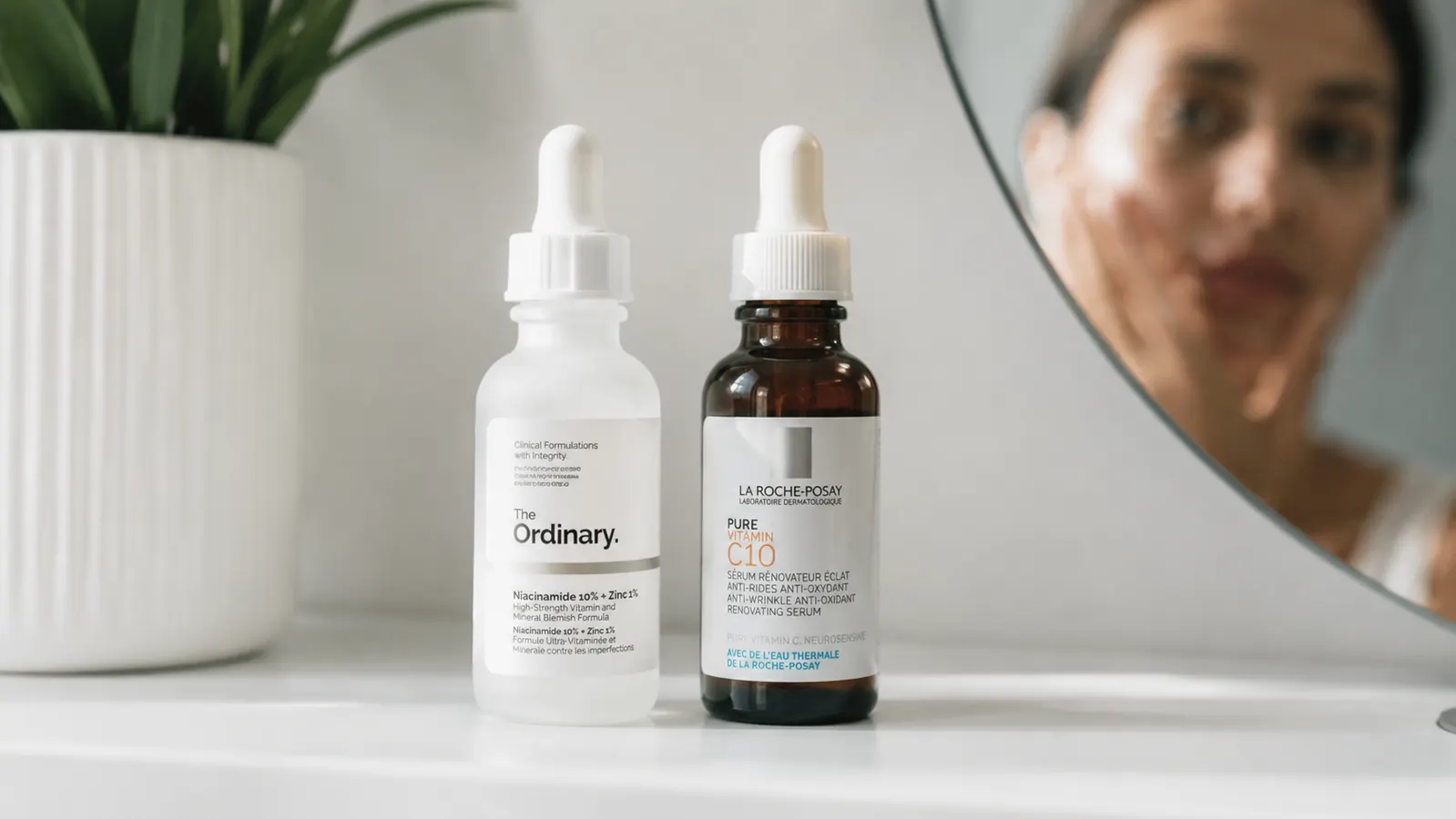 CeraVe Retinol Serum bottle next to The Ordinary retinol bottle on a white bathroom shelf